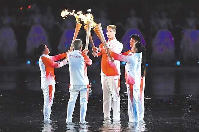 侨心映全运_乡情架桥梁